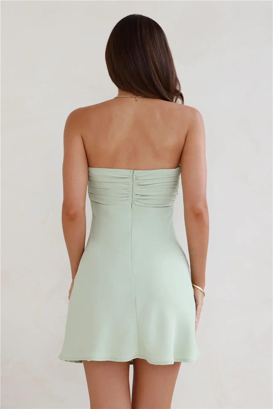A sweet and spicy strapless mini dress – a must-have for a flirty and alluring look